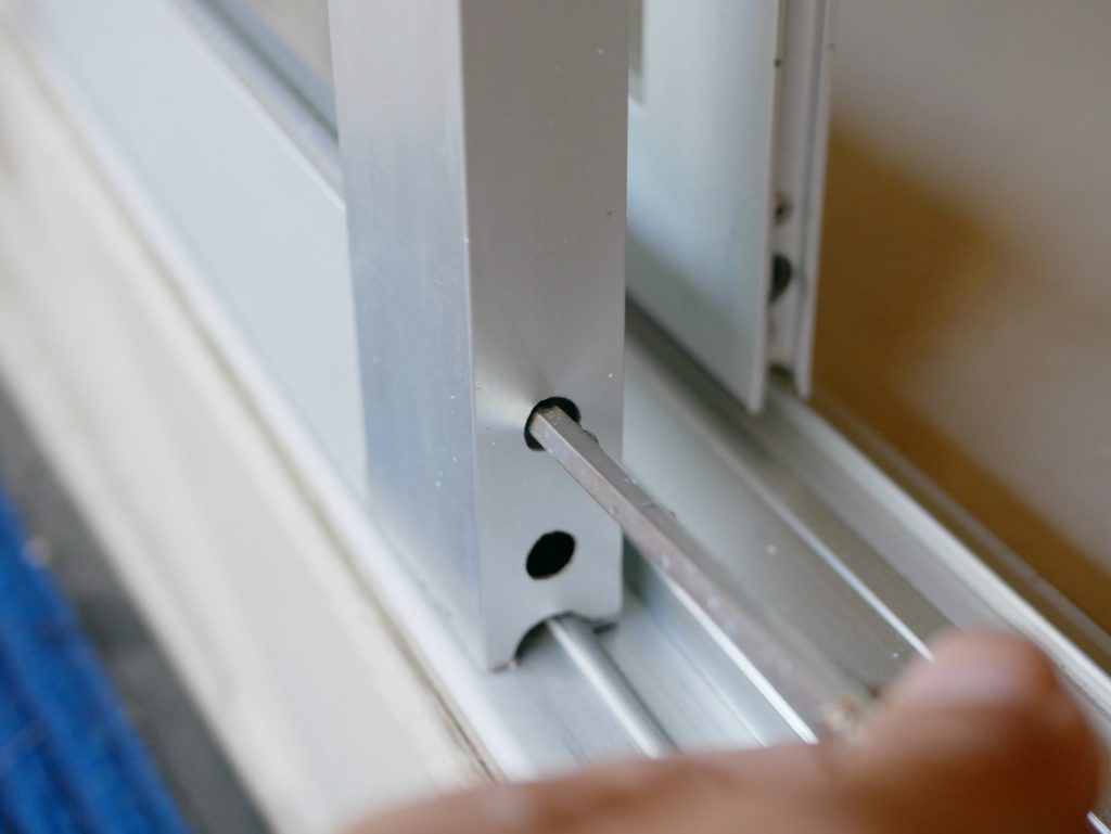 sliding door rollers adjustment